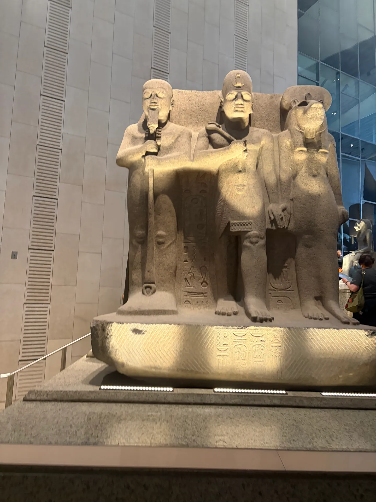 Ancient royal family sculpture inside the Grand Egyptian Museum