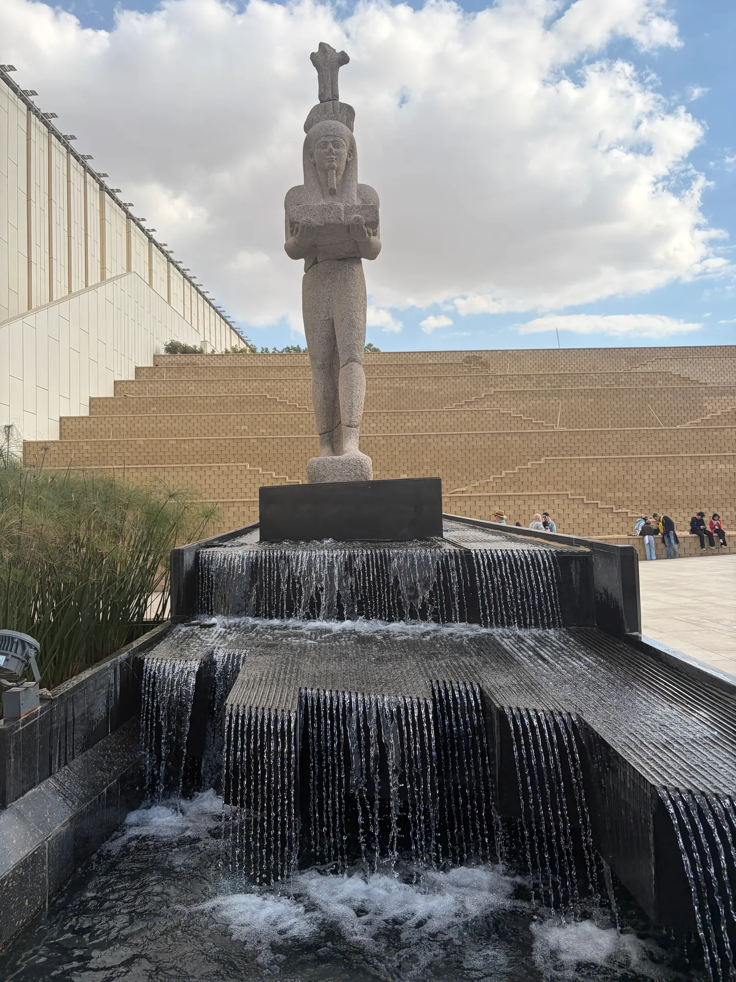 Museum courtyard fountain and monumental Egyptian statue
