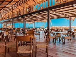 Open-air restaurant seating on Eden Island