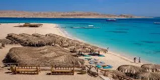 Aerial view of Hula Hula Beach, its sunshades and turquoise Red Sea water