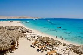 Aerial view of Mahmya Island beach and shaded loungers