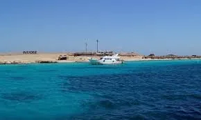 Mahmya Island shoreline and boats viewed from the sea