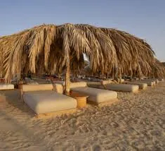 Thatched beach seating at Ozirea Island