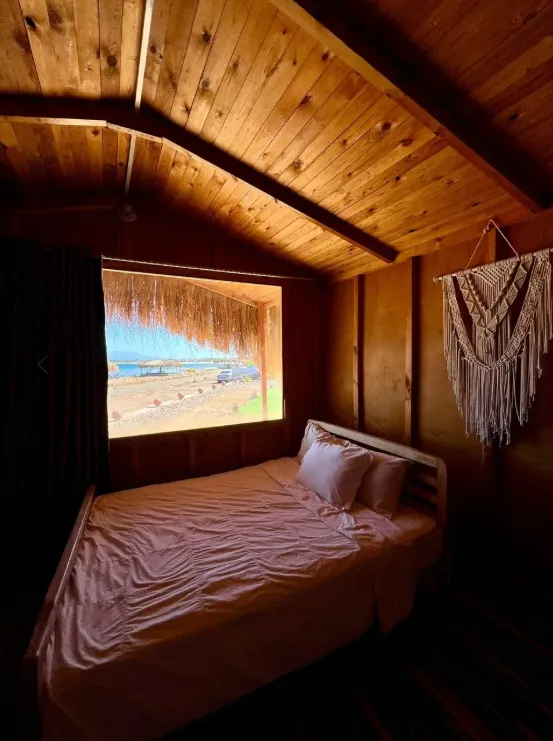 Simple wooden guest cabin at the Sinai camp